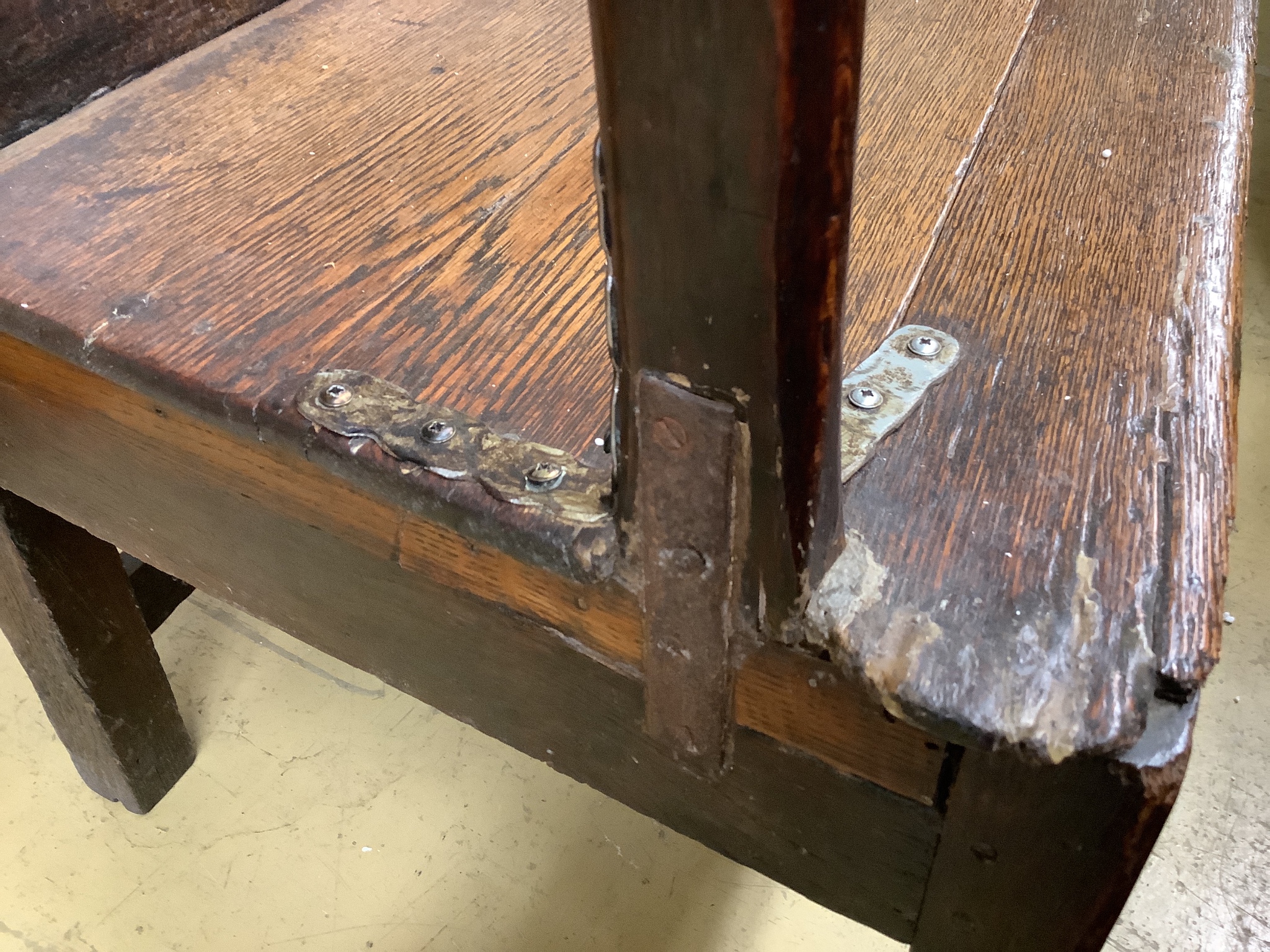 An early 18th century oak elbow chair